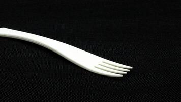 2. White plastic fork isolated photo