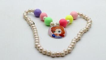 5. Child beaded necklace isolated photo