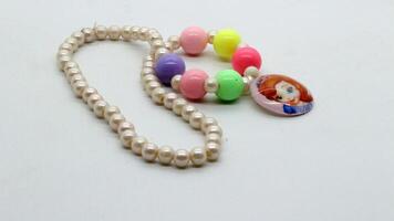 4. Child beaded necklace isolated photo