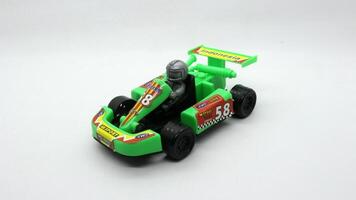 1. F1 car toy isolated on white background photo