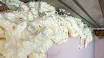 Ethereal cloud like insulation foam resembles a frothy extravaganza, evoking abstract art or quirky International Foam Awareness Day celebration photo