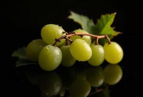 Fresh Green Grapes With Water Droplets On A Dark Reflective Surface photo