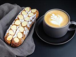 A tempting pastry accompanied by a rich cup of coffee perfectly presented for a delightful afternoon treat photo