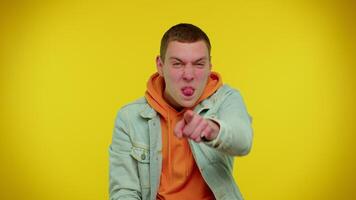 Funny showing tongue making faces at camera, fooling around, joking, aping with silly face, teasing video