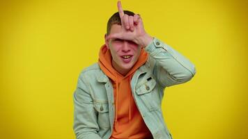 Man showing loser gesture and pointing on you, blaming accusing for unsuccess bullying abuse video