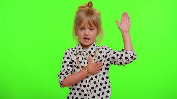 Child kid swear to be honest, aising hand to take oath promising to tell truth keeping hand on chest video