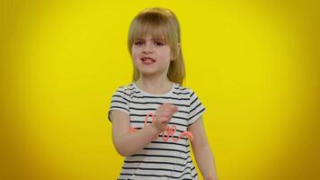 Displeased blonde child girl gesturing hands with irritation, displeasure, blaming, failure, quarrel video