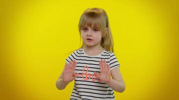 Frustrated annoyed irritated kid child girl covering ears and gesturing no, avoiding advice, noise video