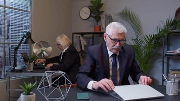 Senior businessman director showing stop gesture with crossed hands say no refuse in modern office video