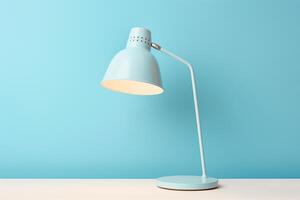 Modern style of desk lamp on blue background photo
