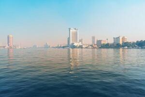 Expansive view of the Nile River with Cairo skyline on a clear day photo