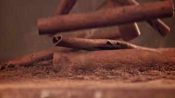 Cinnamon sticks fall on the table. Filmed on a high-speed camera at 1000 fps. High quality FullHD footage video