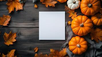 Autumn Thanksgiving Background with Pumpkins and Blank Card on Wooden Table photo