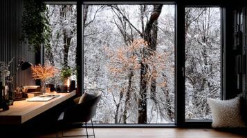 Cozy Winter Study with Desk Lamp and Snow View photo