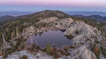 Serene Mountain Lake at Dusk with Full Moon photo