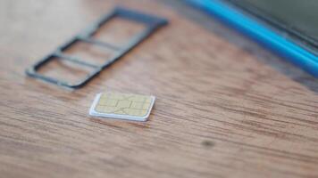 How to properly insert a SIM card into a mobile device video
