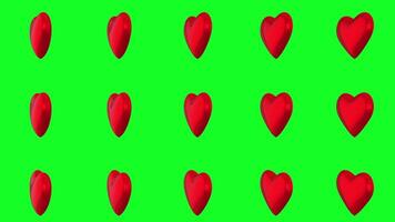 A Group of Red Heart Rotating on Green screen background. Symbol of Cardiogram and Medical diagnostics in Ultra 3D. video