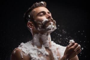 Caucasian man covered in shaving cream, preparing for his shaving routine photo