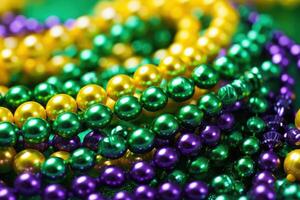 Mardi gras beads glimmering in green, gold, and purple on sparkling background photo