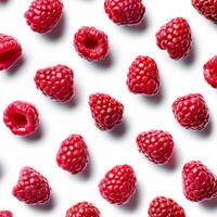 Fresh raspberries arranged on white background creating seamless pattern photo