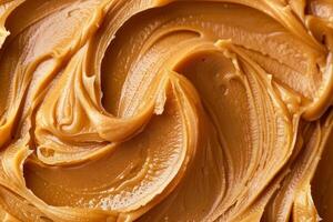 Creamy peanut butter swirls creating delicious texture photo
