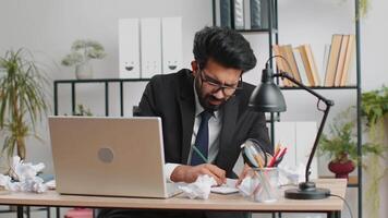 Angry furious man working at home office throwing crumpled paper, having nervous breakdown at work video