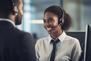 Smiling customer service representative assisting a client in office environment photo