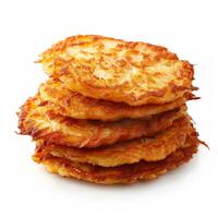 Stack of potato pancakes on white background making delicious breakfast photo