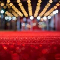 Red carpet entrance with sparkling glitter and blurred lights creating festive atmosphere photo