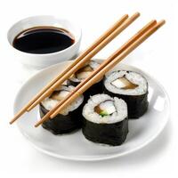 Hosomaki and uramaki sushi rolls with chopsticks and soy sauce on white background photo