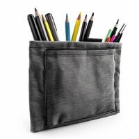 Gray pencil case bursting with colorful writing instruments on white background photo