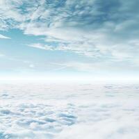 Cloudscape with light blue sky and soft white clouds creating a peaceful atmosphere photo