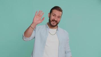 Man showing inviting gesture with hands, ask to join, beckoning to coming, gesturing hello greetings video