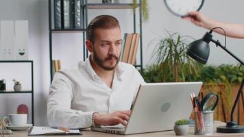 Young businessman with anxiety checking time on clock, running late to work being in delay deadline video