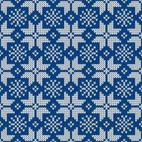 Christmas and New Year traditional knitted seamless pattern with snowflakes. Norwegian style sweater. Wool texture, illustration vector