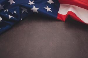 Part of the American flag is on a vintage background with copy space for text. Flat lay. photo