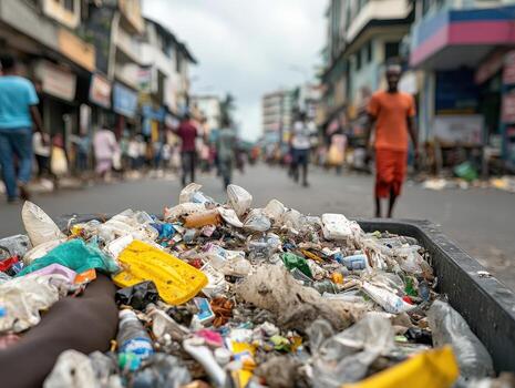 A street scene cluttered with garbage, highlighting urban waste management issues and the impact of littering on the environment. photo