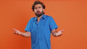 Man raising hands in indignant expression ask why what reason of failure demonstrating disbelief video