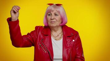 Elderly granny woman showing nonsense gesture with hands, gossips, empty promises, lier concept video