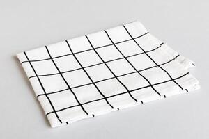 top view white empty kitchen napkin isolated on table background. Folded cloth for mockup with copy space, photo