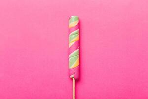 Colorful candies, lollypop the colorful background, multicolored minimal style top view photo