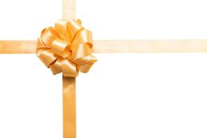 Gold ribbon bow isolated white background. empty space for design photo