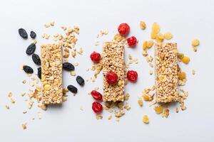Various granola bars table background. Cereal granola bars. Superfood breakfast bars with oats, nuts and berries,Superfood concept photo