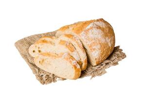 Assortment freshly sliced baked bread napkin isolated on white background. Healthy unleavened bread. French bread slice photo