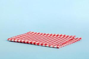 top view red empty kitchen napkin isolated table background. Folded cloth for mockup with copy space, Flat lay. Minimal style photo
