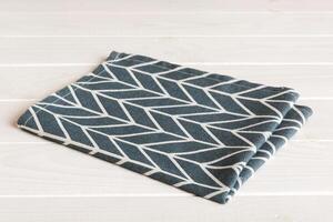 top view with blue kitchen napkin isolated table background. Folded cloth for mockup copy space, Minimal style photo