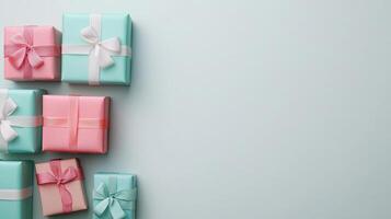 Colorful Gift Boxes with Bows on Pastel Background Perfect for Celebrations, Birthdays, and Special Occasions photo