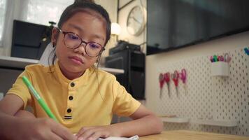 Mother and child sharing learning time at home with bright atmosphere video