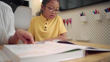 Student listening to instructions while studying at home video