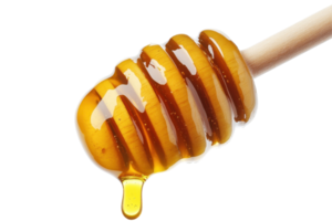 Close-up view of honey dripping from a wooden dipper. png